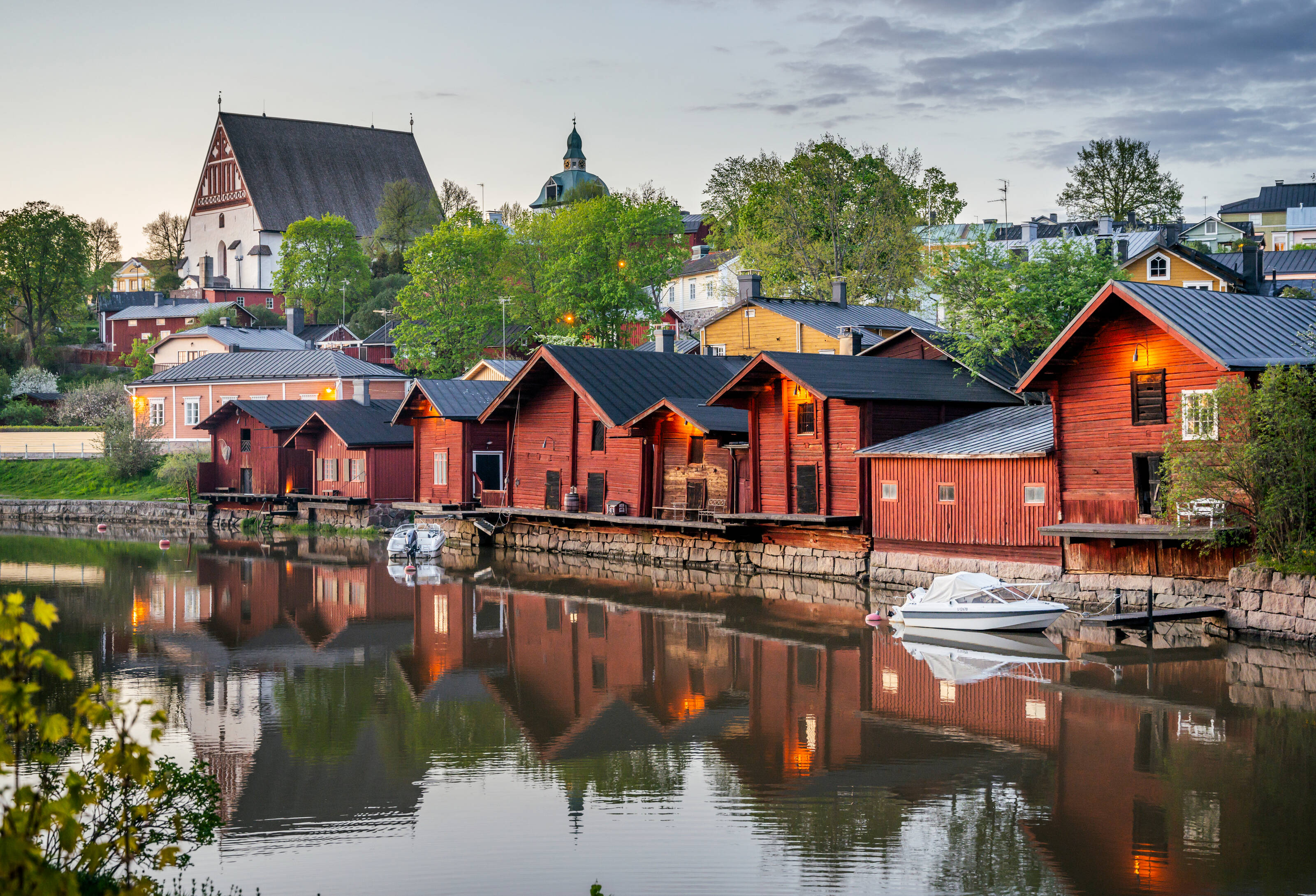 Idyllic wooden red ochre buildings in a coastline