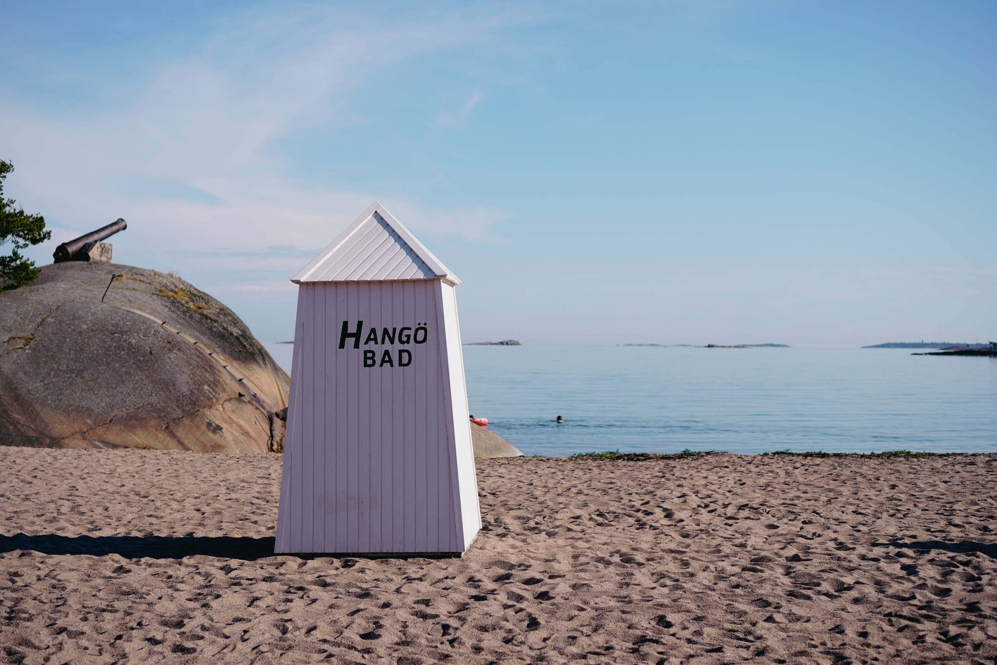Hanko beach with a beach hut and a view of the Baltic Sea in the summer.