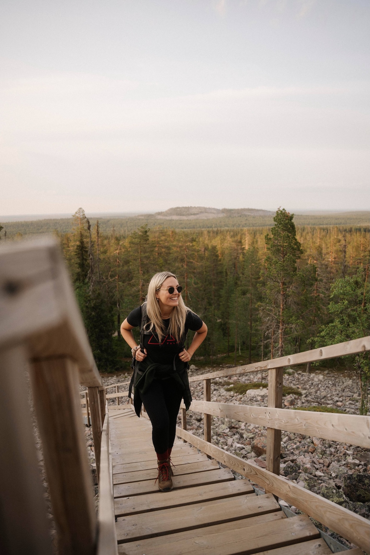 Woman hiking in Pyhä-Luosto National Park in Lapland, Finland.